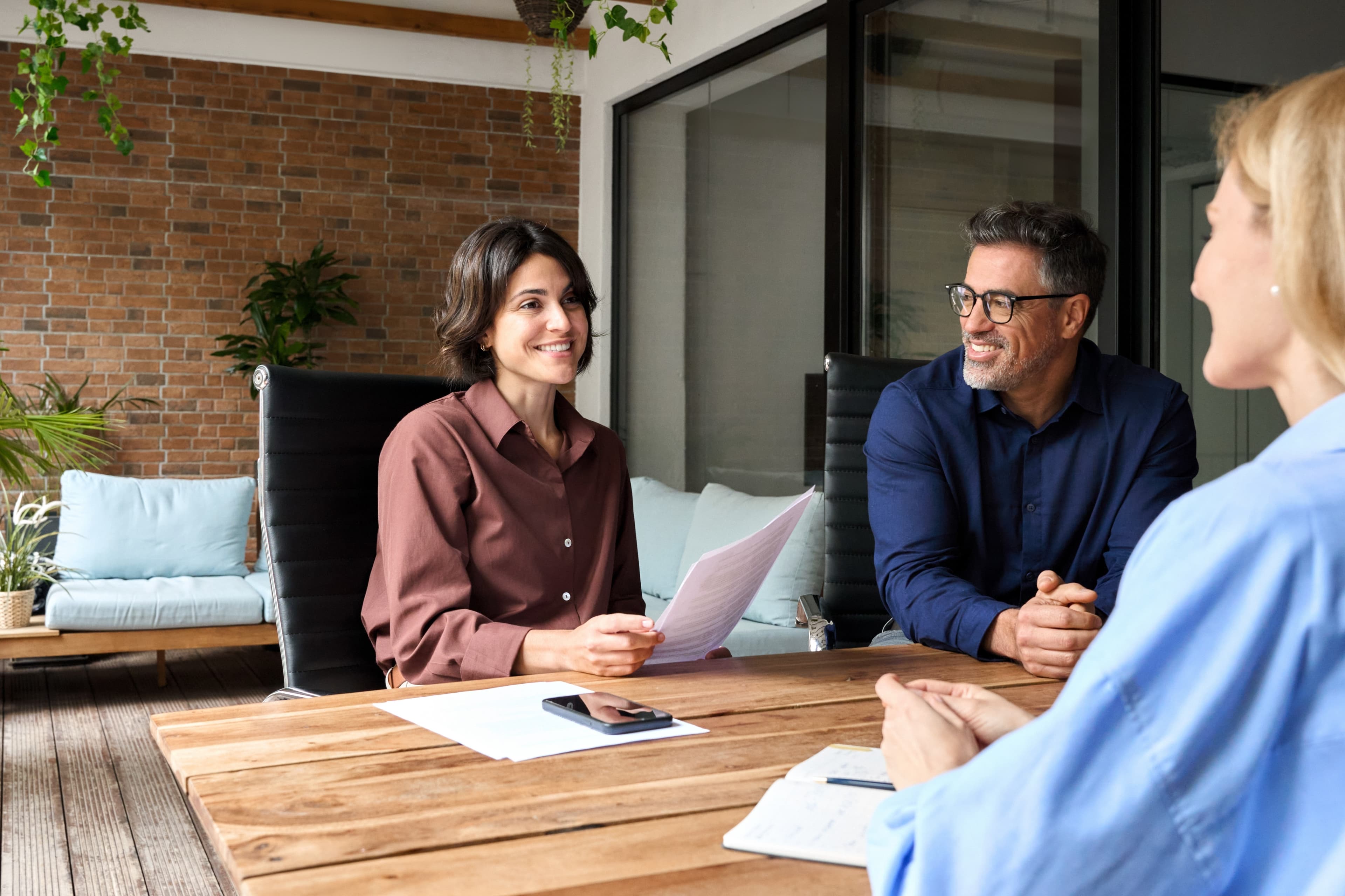 Female manager working with colleagues